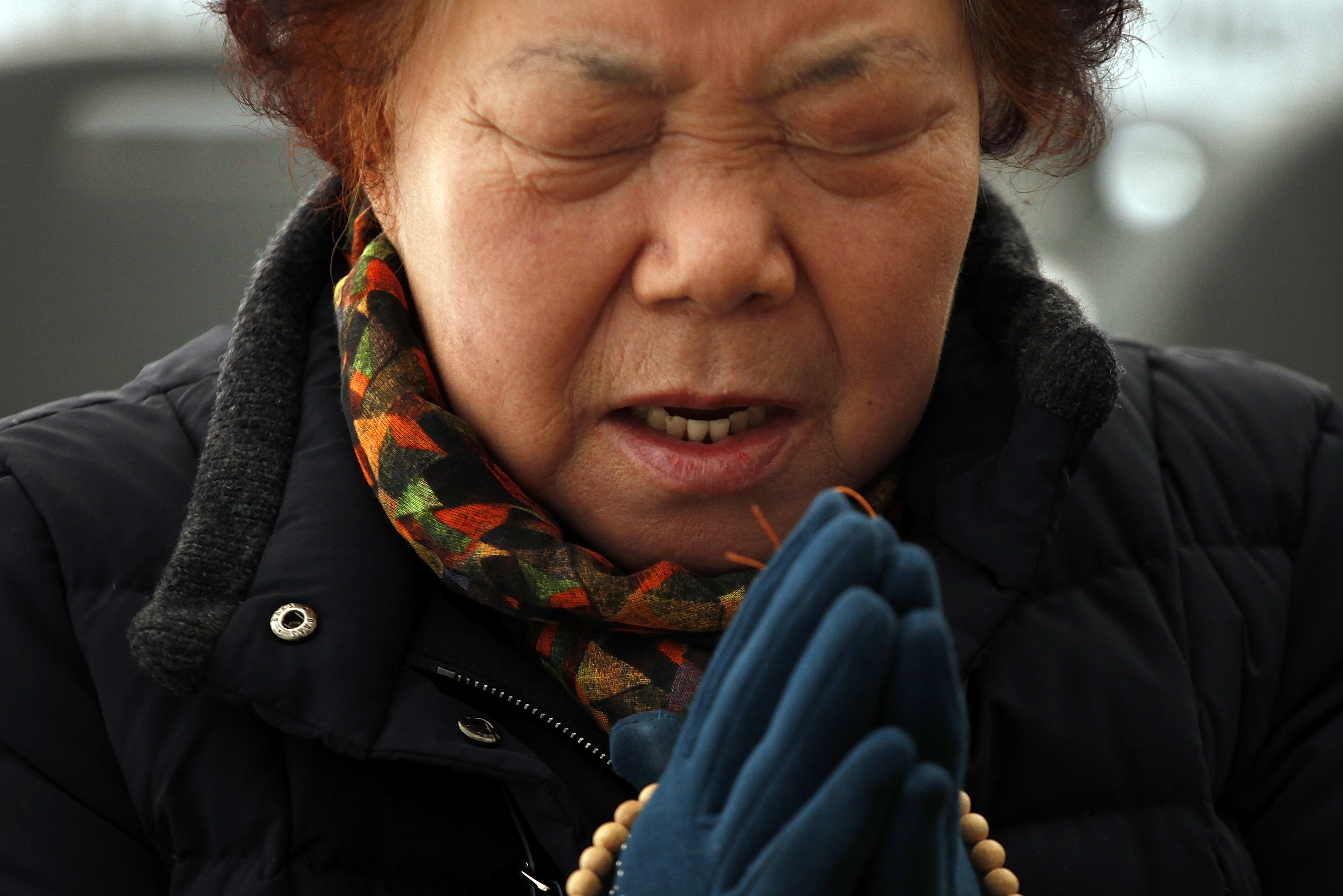 Cha me Han Quoc thap nen, cau nguyen con 'vuot vu mon' hinh anh