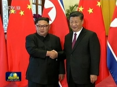 Lan 3 trong 3 thang, Tap Can Binh tiep don Kim Jong Un hinh anh