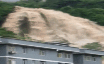 Lu quet nhu sap nuot chung toa nha o Trung Quoc hinh anh