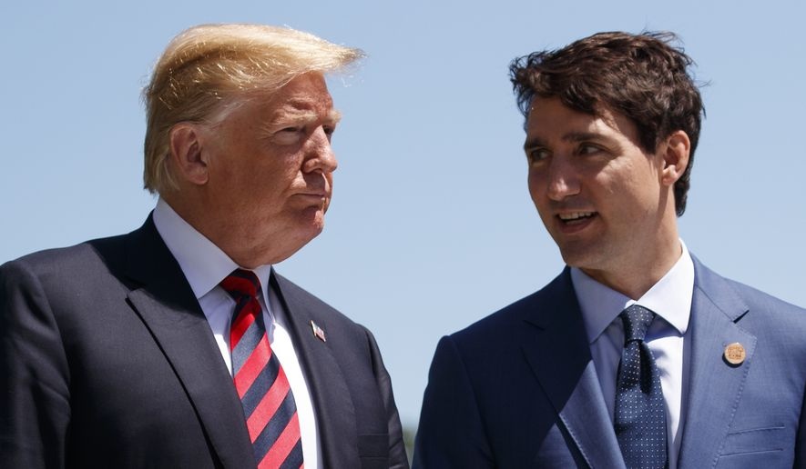 Tong thong Trump len an Canada, tu choi gap Thu tuong Trudeau hinh anh