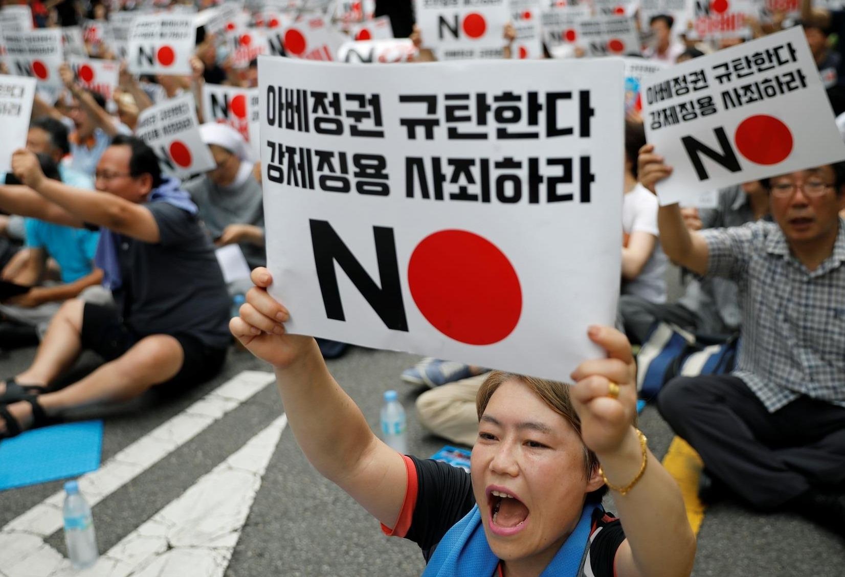 'Noi khong voi Abe' - lan song chong Nhat dang cao tai Han Quoc hinh anh