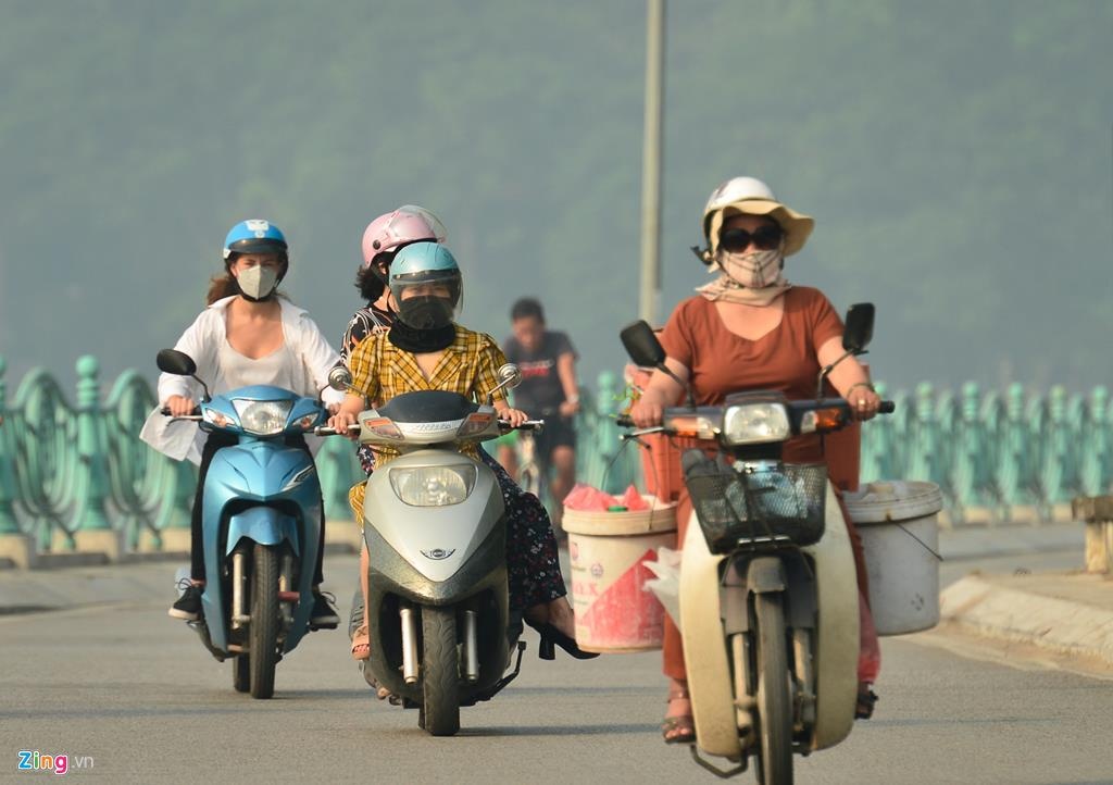 Anh khuyen cao cong dan luu y o nhiem khong khi o HN va TP.HCM hinh anh