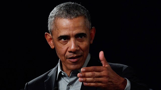 Barack Obama canh bao anh 1