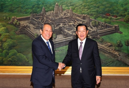 Pho thu tuong Truong Hoa Binh hoi kien Thu tuong Hun Sen hinh anh