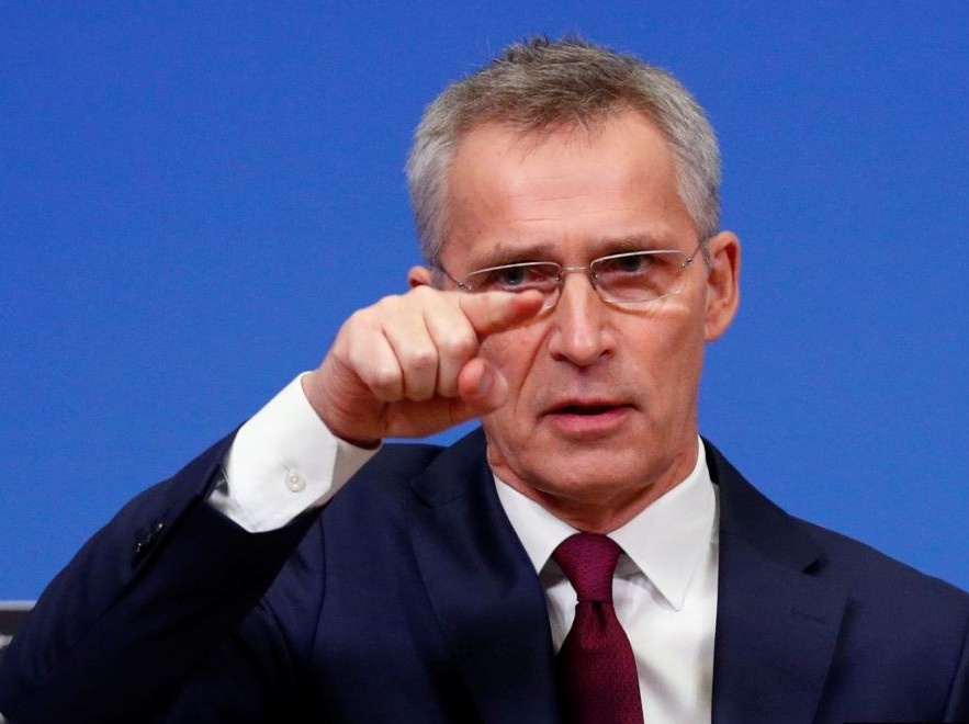 Lanh dao NATO keu goi dung len chong bat nat giua luc TQ troi day hinh anh