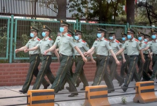 Dich bung phat manh o cho ban buon lon nhat Bac Kinh hinh anh