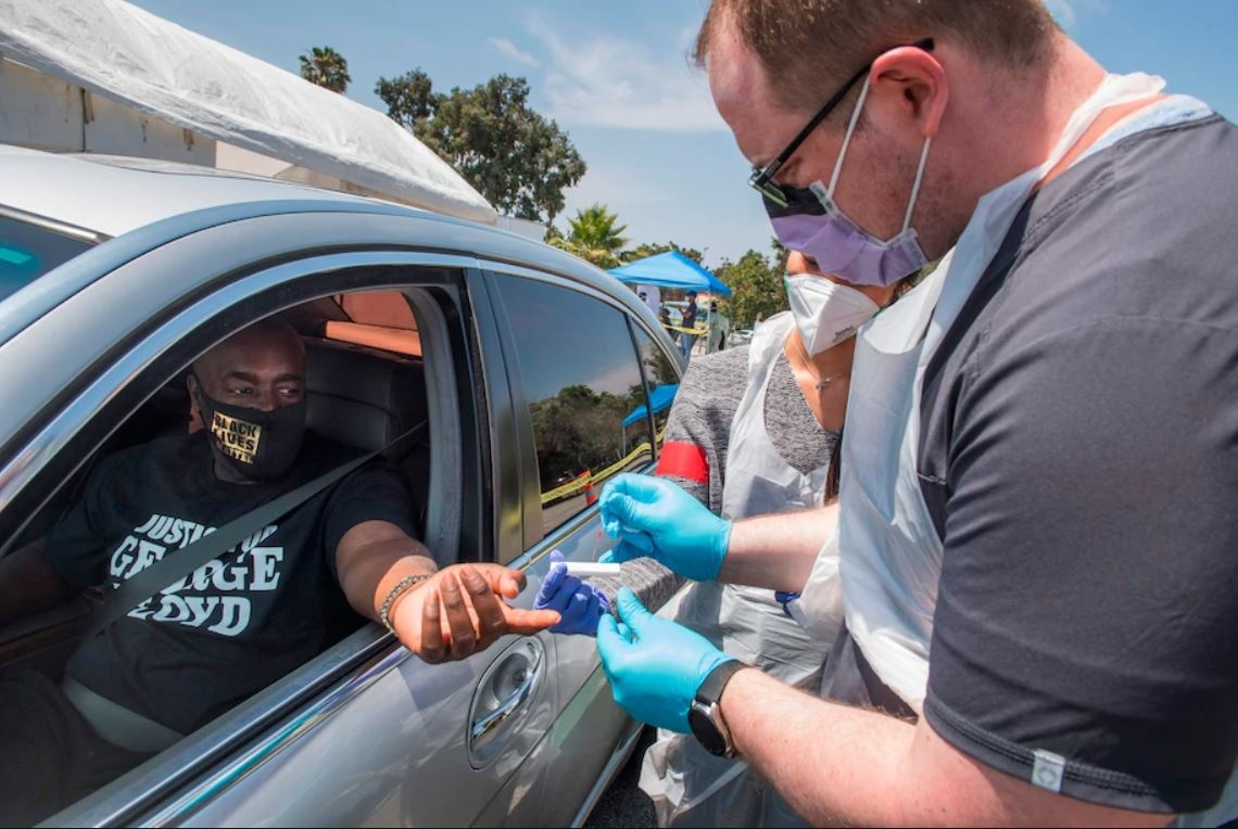 Bay bang o My co so ca Covid-19 nhap vien cao nhat tu dau dai dich hinh anh