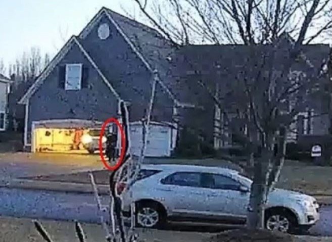 Canh sat My ban chet thieu nien, sau do duoc boi thuong 70.000 USD hinh anh