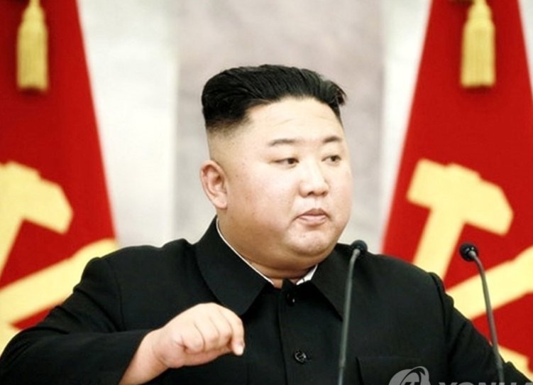 Ong Kim hop Quan uy Trung uong, ban ve 'ran de chien tranh' hinh anh