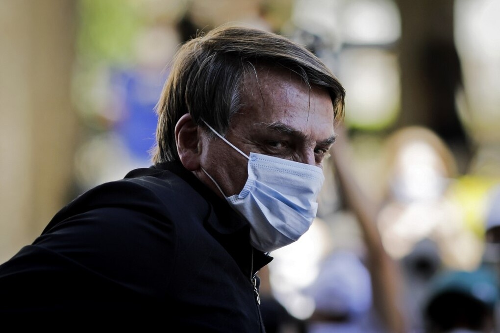 Tong thong Brazil doa dam phong vien hoi ve vo ong hinh anh