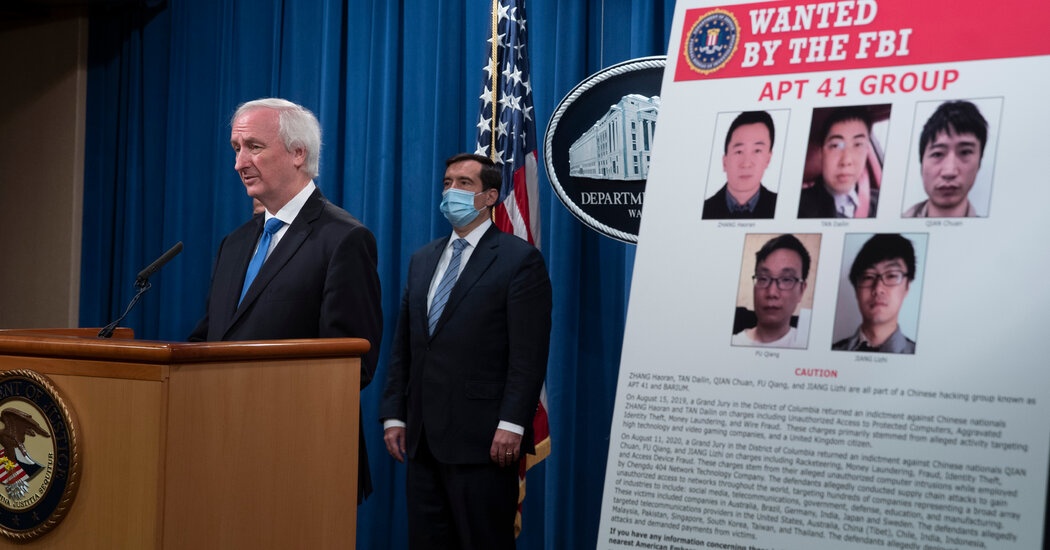 My: Tin tac Trung Quoc tan cong hon 100 cong ty, to chuc hinh anh