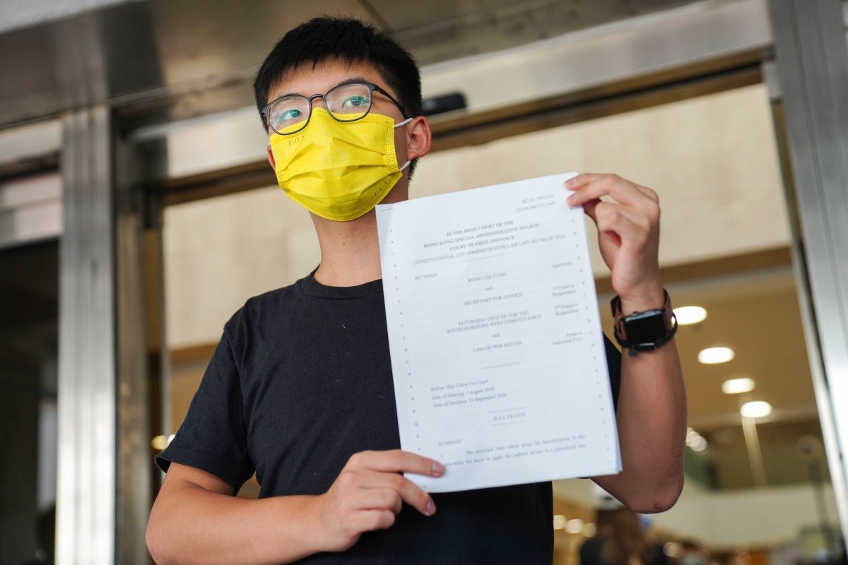 Hoang Chi Phong bi canh sat Hong Kong bat giu hinh anh