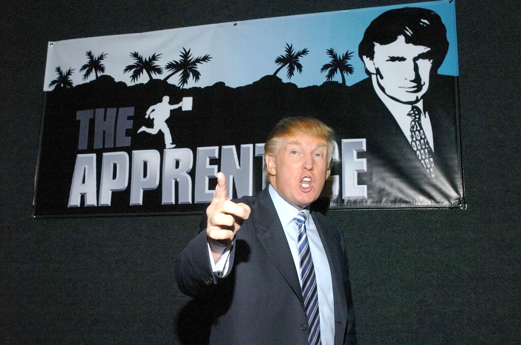 con bao tai chinh ap den voi trump anh 1