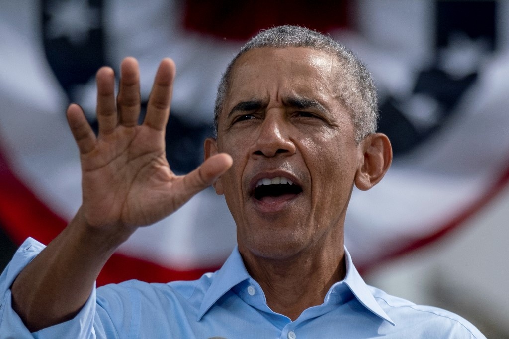 Ong Obama 'an mieng tra mieng' voi nguoi ke nhiem hinh anh