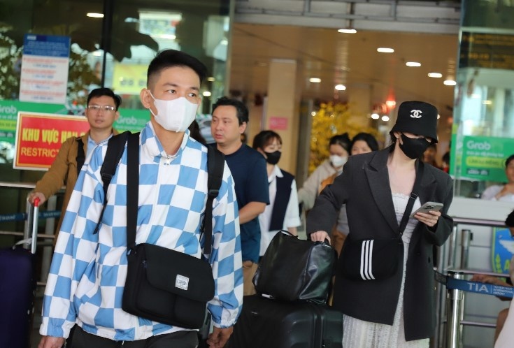 San bay Tan Son Nhat don 136.000 khach, xac lap dinh moi Tet Giap Thin hinh anh