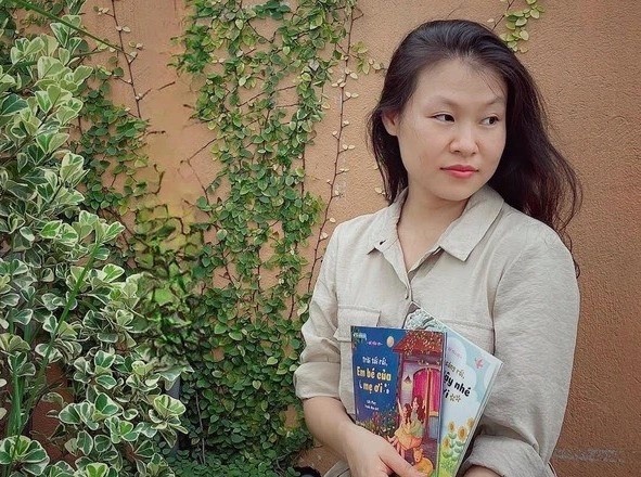 Nha van May, nguoi 'vun dap tam hon' cho tre em hinh anh