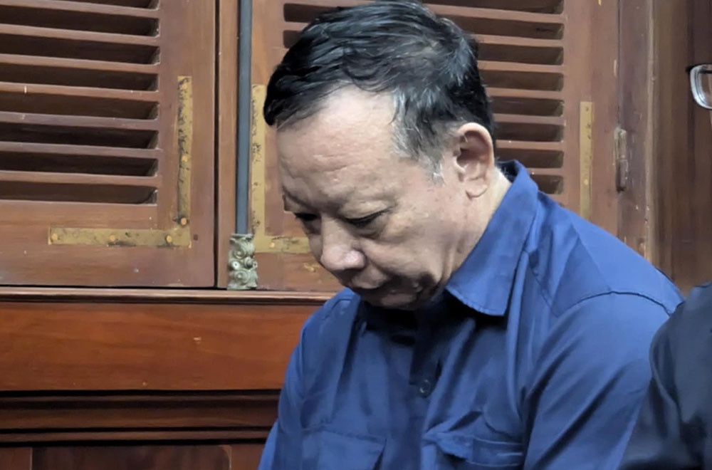 Nhan tien tu Nguyen Thi Thanh Nhan, cuu giam doc dung 'cho con di hoc' hinh anh