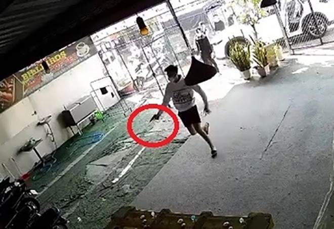 Cong an xac dinh Tri 'dien' la ke cam dau vu no sung tai quan bida hinh anh