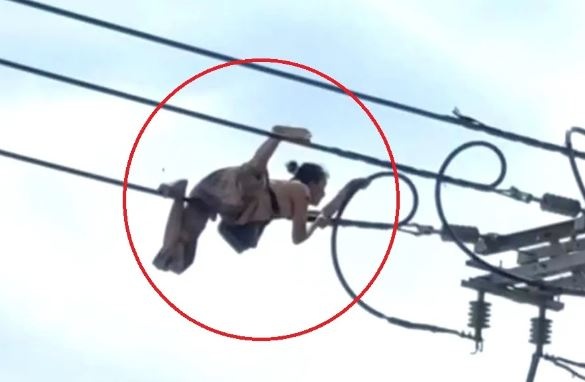 Nguoi phu nu treo len day dien o TP.HCM da tu vong hinh anh