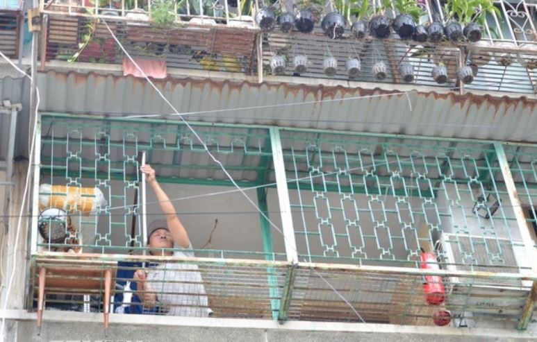 Cu dan nhieu chung cu o TP.HCM dong loat thao 'chuong cop' vi so chay hinh anh