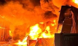 Chay lon xuong san xuat hop dung com o TP.HCM hinh anh