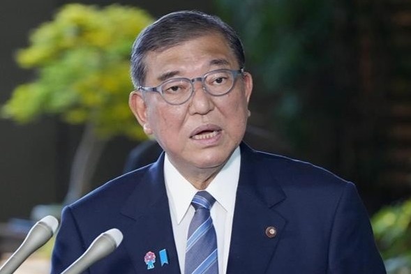 Thu tuong Nhat Ban cong bo y dinh tu chuc hinh anh