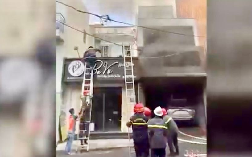 Cuu 6 nguoi trong vu chay nha 5 tang o TP.HCM hinh anh