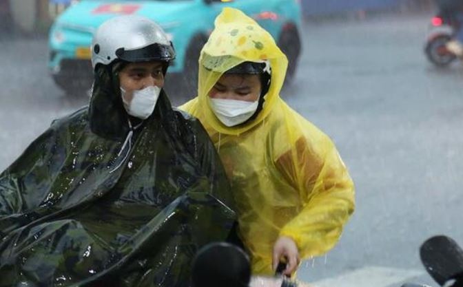 Thoi tiet ngay 4/10: TP.HCM mua rao va dong, Ha Noi nang to hinh anh