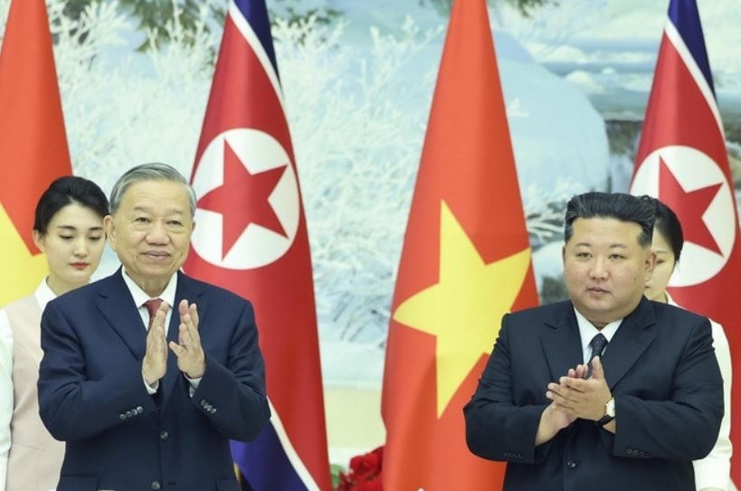 Chieu dai chao mung Tong Bi thu To Lam tham Trieu Tien hinh anh