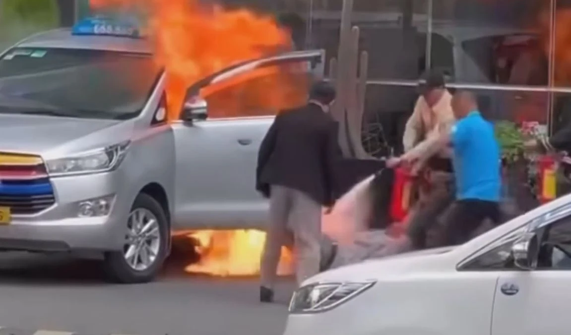 Khoanh khac taxi boc chay truoc khach san o Lam Dong hinh anh