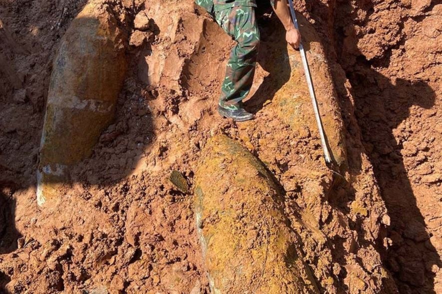 Phat hien qua bom nang 350 kg khi lam ruong o Bac Ninh hinh anh