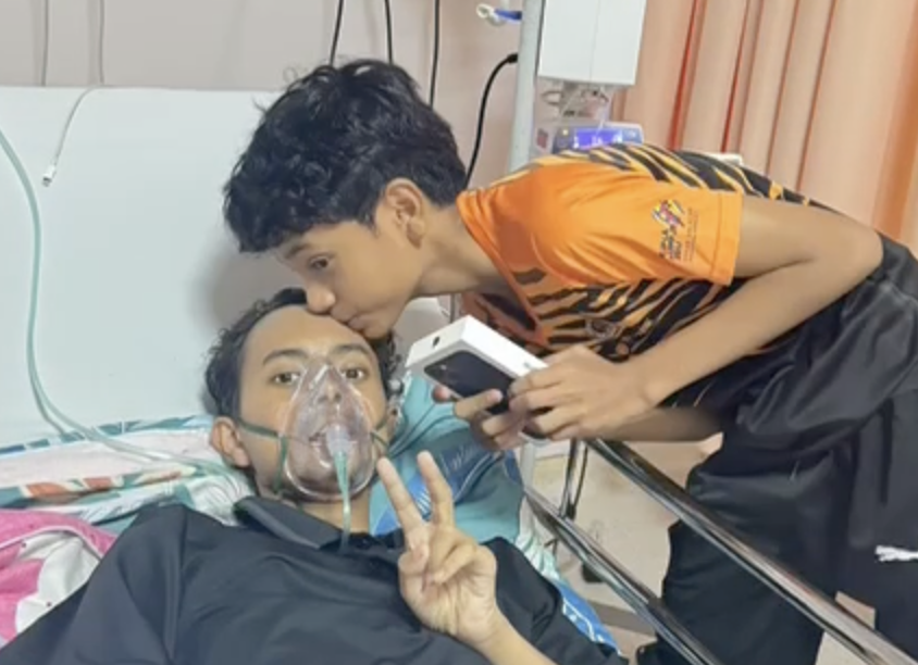 Khoanh khac cau be 15 tuoi tang em trai iPhone truoc khi qua doi hinh anh