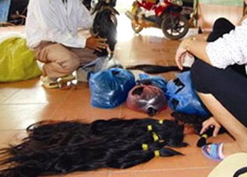 Nan cuop toc phu nu bung phat tai Venezuela hinh anh