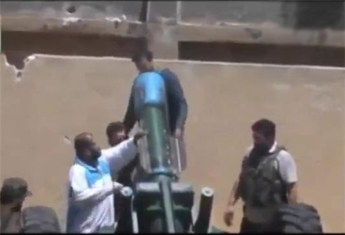 Iran cong bo bang chung phe doi lap Syria dung khi doc hinh anh