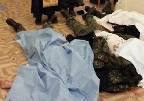 Phat hien 21 xac nguoi tren quang truong o thu do Ukraina hinh anh