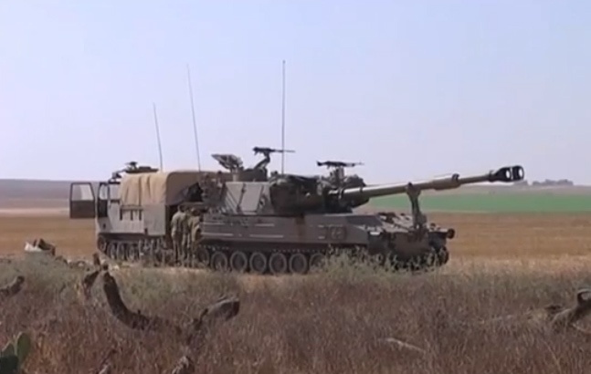 Xe tang Israel quan thao gan dai Gaza hinh anh