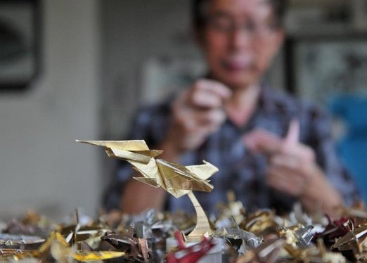 Thay giao Trung Quoc gap 10.000 may bay chien dau bang giay hinh anh