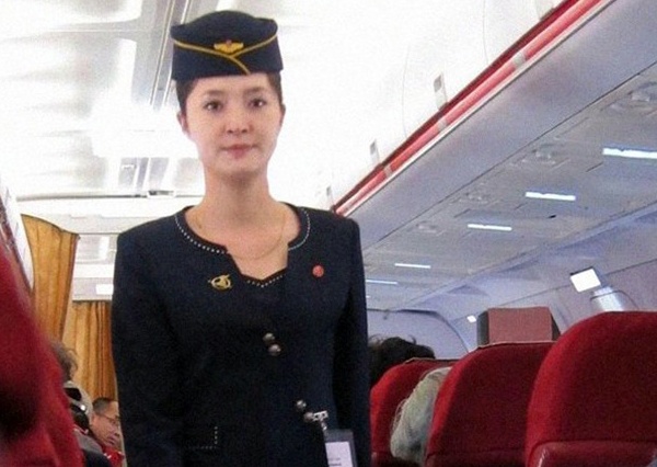 Do nhan sac nu tiep vien Han Quoc va Trieu Tien hinh anh