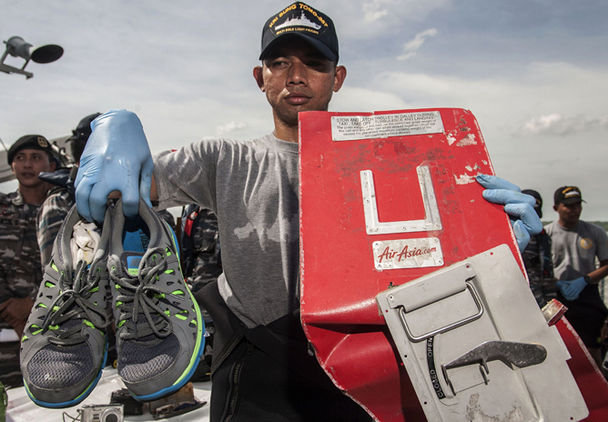 Nhung di vat cua nan nhan tham kich QZ8501 hinh anh