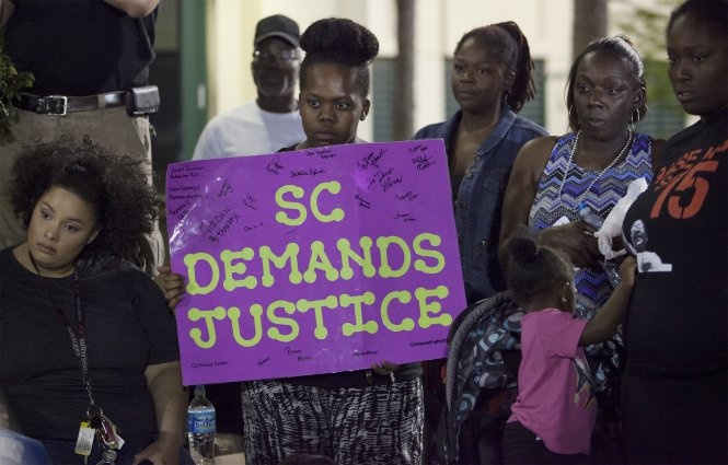 Tac gia video canh sat ban nguoi: 'Toi so bi de doa' hinh anh