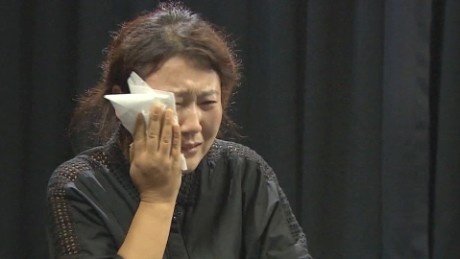 Noi long nguoi phu nu dao tau muon tro lai Trieu Tien hinh anh