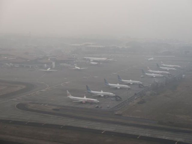 Philippines huy nhieu chuyen bay vi khoi mu day dac hinh anh