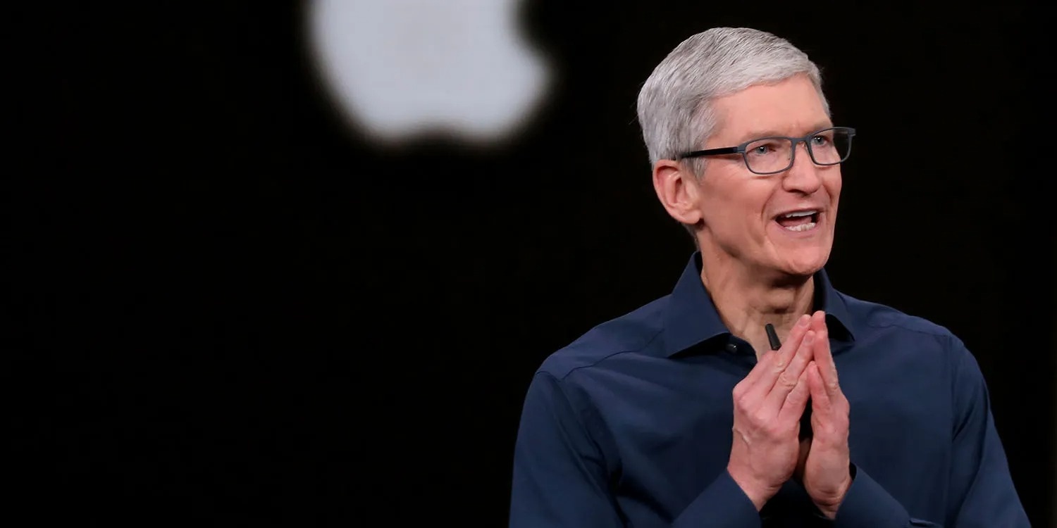 Tim Cook bi giam luong anh 1