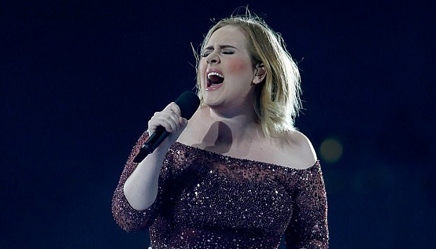 Adele hat tuong niem nan nhan vu khung bo London hinh anh