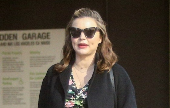 Miranda Kerr tang can trong thay, khe ne voi bung bau xuong pho hinh anh