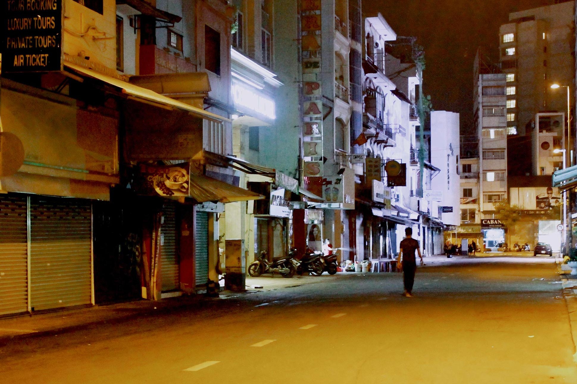 2 nam vang lang cua pho Ma Lai o TP.HCM hinh anh