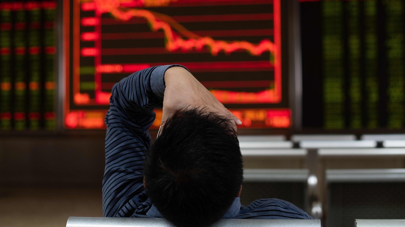 Nha dau tu quoc te ban thao co phieu cac cong ty Trung Quoc hinh anh