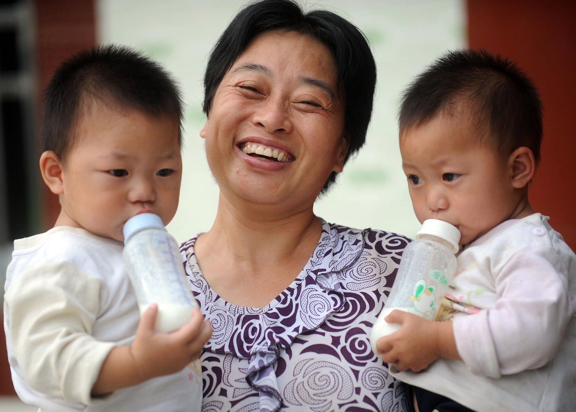 Thanh pho Trung Quoc tang tien mat de khuyen khich sinh con hinh anh