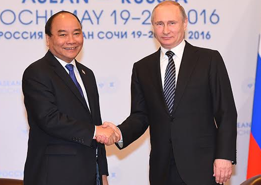 Ong Putin: Tranh chap Bien Dong can giai quyet bang luat hinh anh