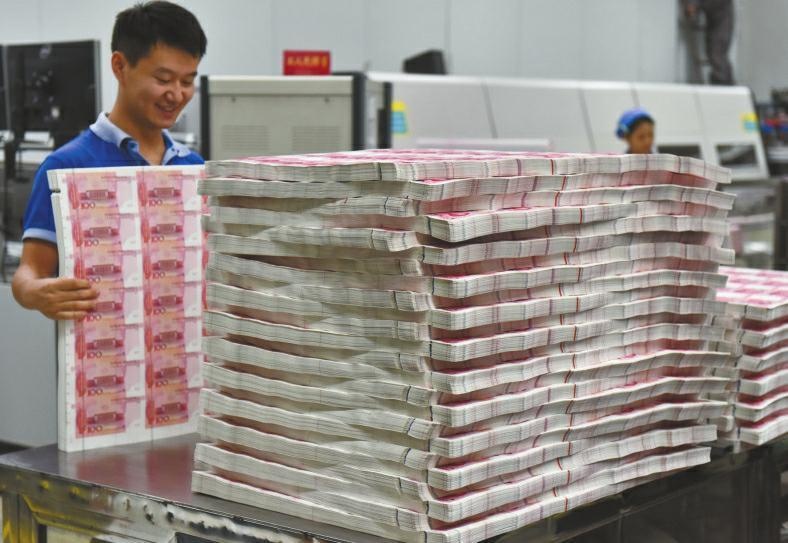 Ben trong nha may in tien Trung Quoc hinh anh